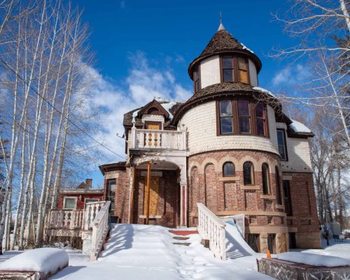 An old quarry stone home that has fallen into disrepair. Hartman Castle is a historic home in Gunnison, CO