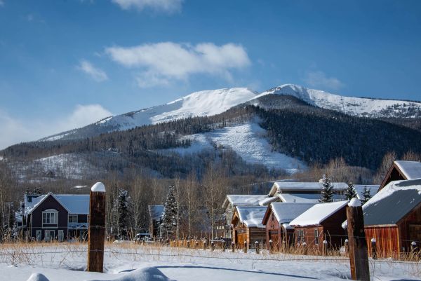 meadow near houses in the mountains