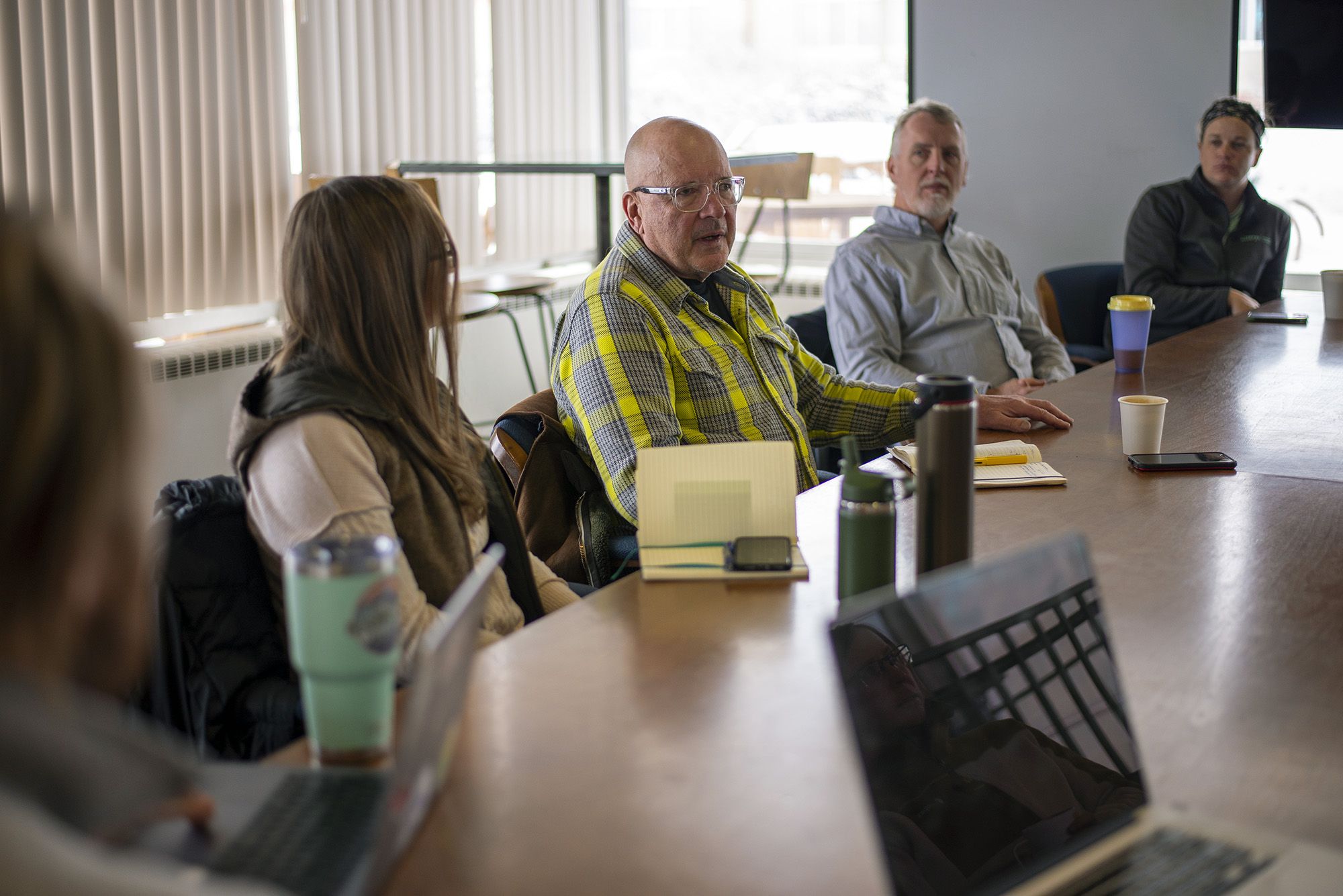 Business leaders chat during a Coffee with Coworkers event at the ICELab.