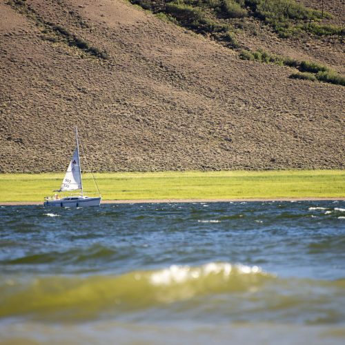 a sailboat on blue mesa reservoir in gunnison colorado