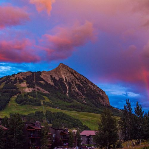 A summer sunset rainbow in Mt. Crested Butte, Colorado.