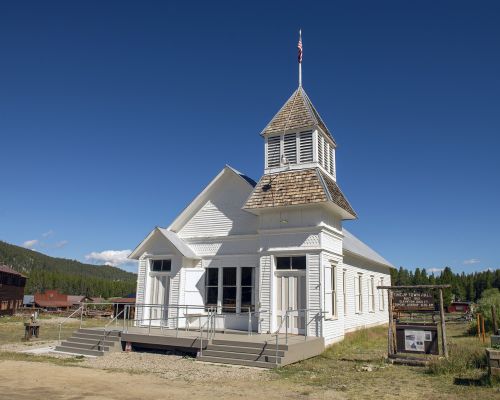 The historic town hall in Tincup, Colorado in summer.