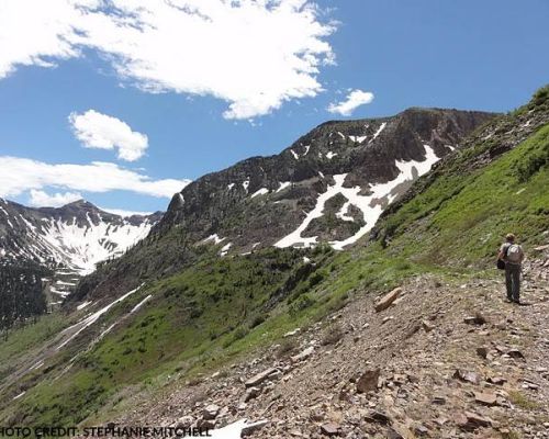 Hiker approaching Augusta Mine near Crested Butte, Colorado
