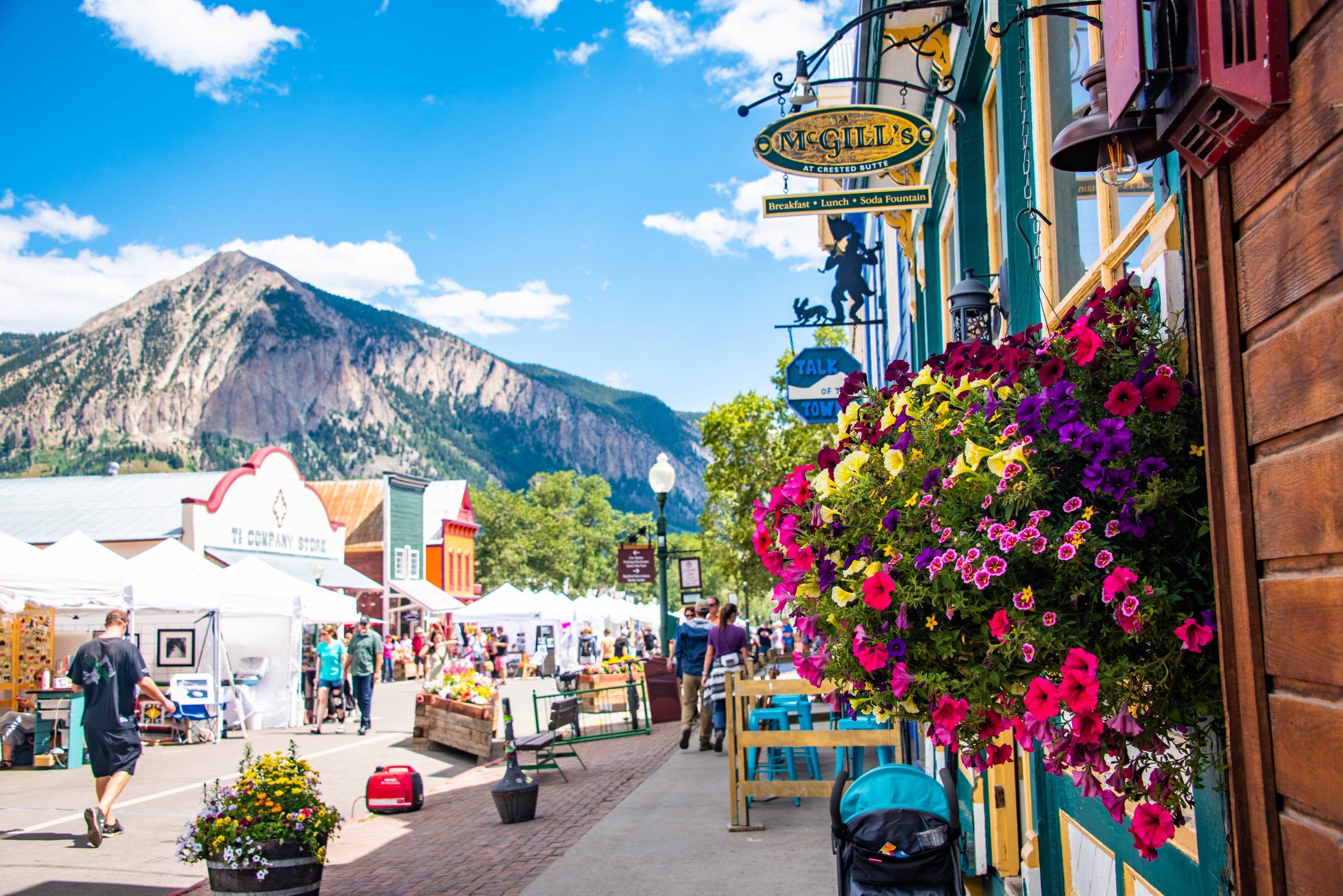 Downtown Crested Butte, Colorado on a sunny day during an event.