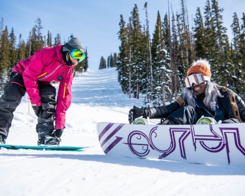 Snowboarders at Crested Butte Mountain Resort in Crested Butte, Colorado