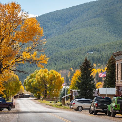 A general store with a large sign and a porch in the town of Pitkin, Colorado.