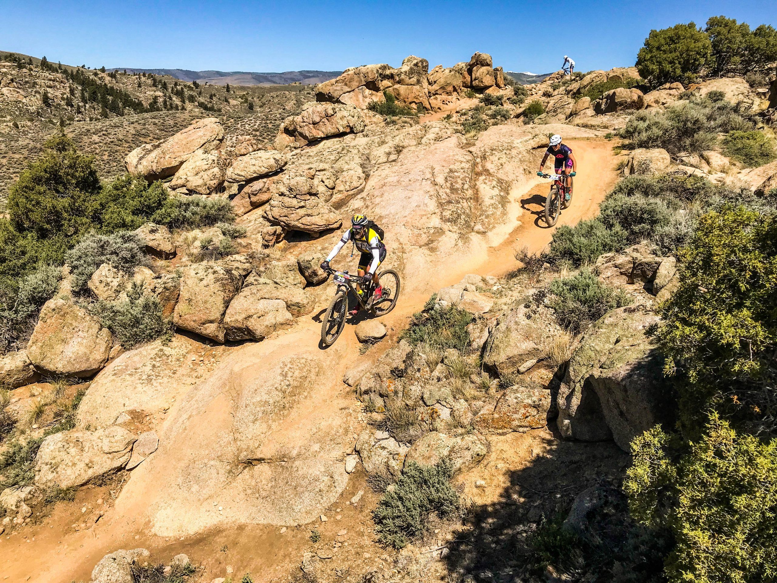 Mountain bikers at Hartman Rocks in Gunnison, Colorado racing in the Original Growler.