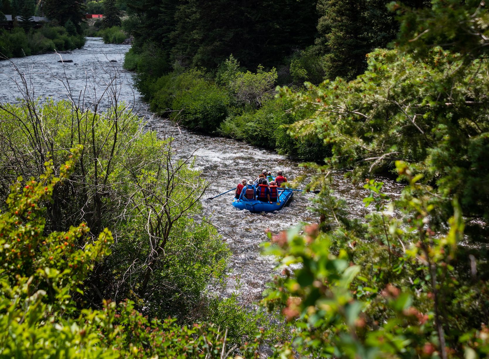 A rubber raft floating on a river