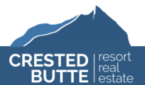 Real estate in Crested Butte, CO with Crested Butte Mt in the background
