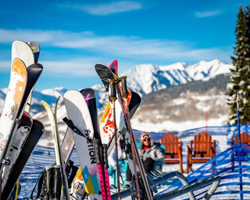 Crested Butte ski gear on a ski rack in winter