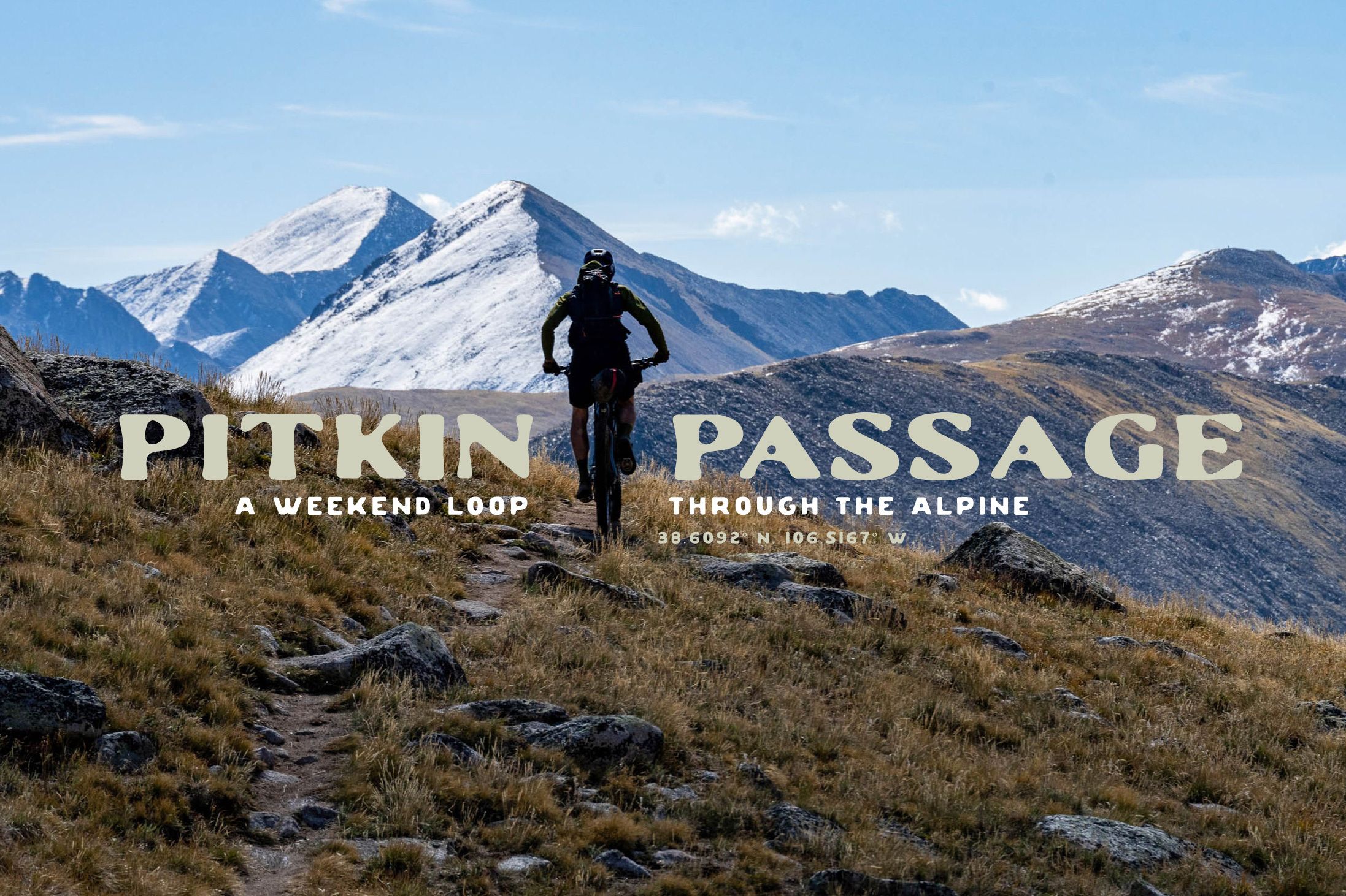 Pitkin Passage gravel biking above treeline with mountains in the background.