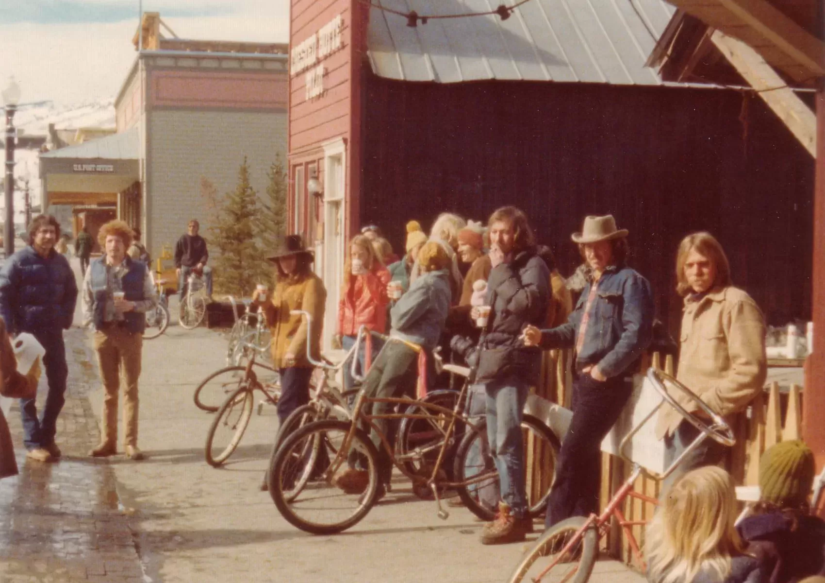 Some of the world's first mountain bikers stand by their klunker bikes in downtown Crested Butte.