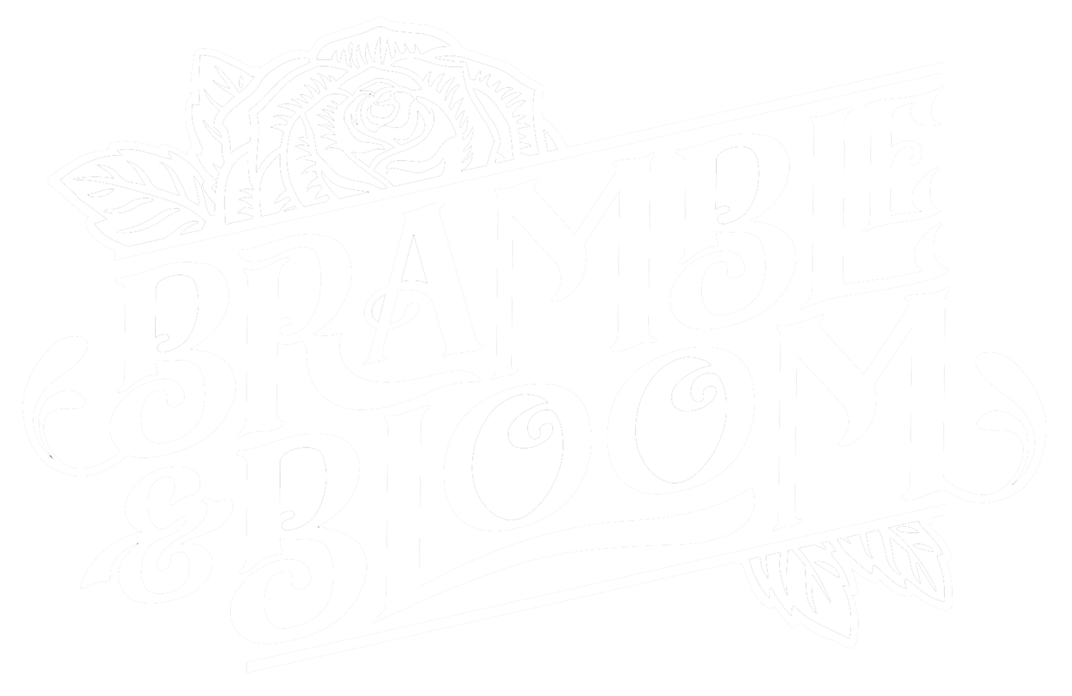 A round arbor with two bunches of flowers on it. The arch frames a view of a pointy mountain peak. crested+butte+wedding+and+event+florals+bramble+and+bloom