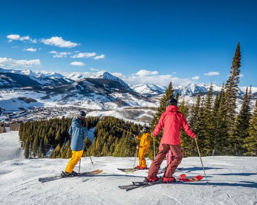 a person skiing at crested butte mountain resort