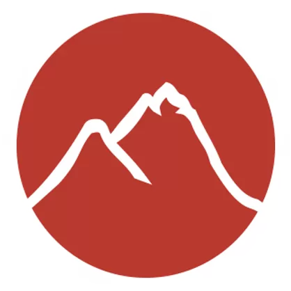 alpine title. a wintery scene with a sunset and snow-covered pine trees.