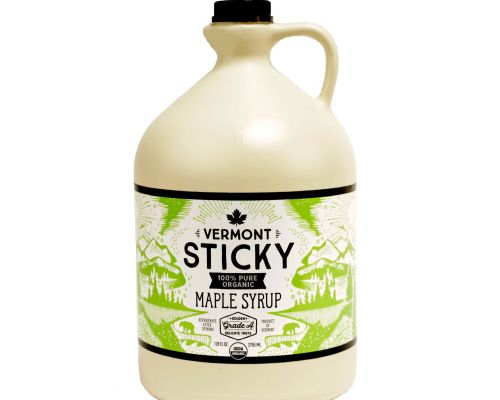 a jug of maple syrup that says "vermont sticky"