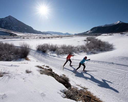 Nordic skiers on a track groomed by CB nordic in crested butte, co