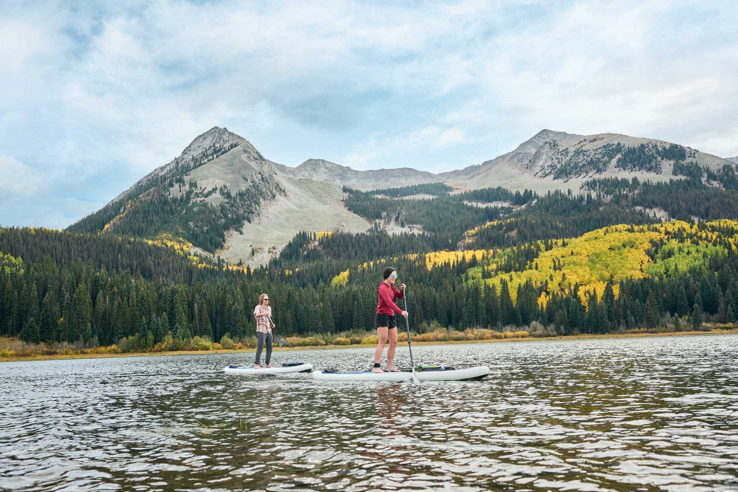 two people SUP on long lake in Crested Butte for a Colorado SUP vacation