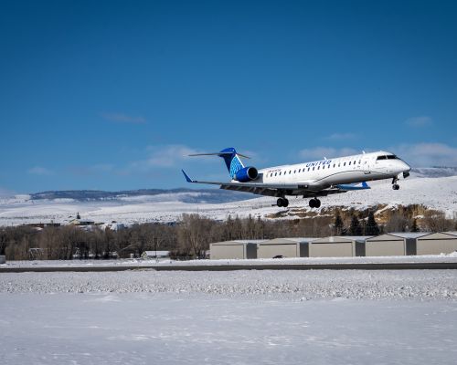 A plane taking off from the runway. Find United flights at Gunnison Crested Butte Airport