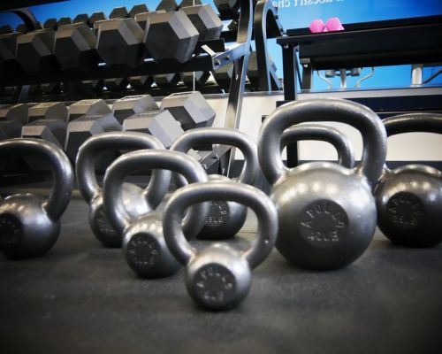 Kettlebells and hand weights at CB South Fitness, a local gym.