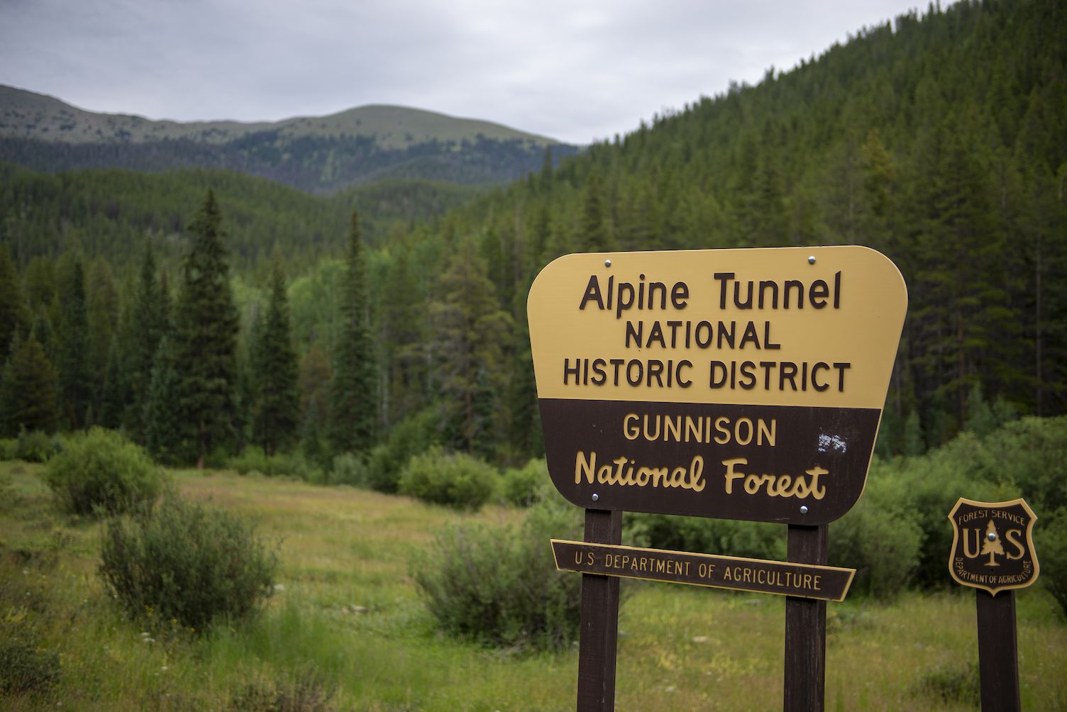 A sign that says "Alpine Tunnel Historic District"