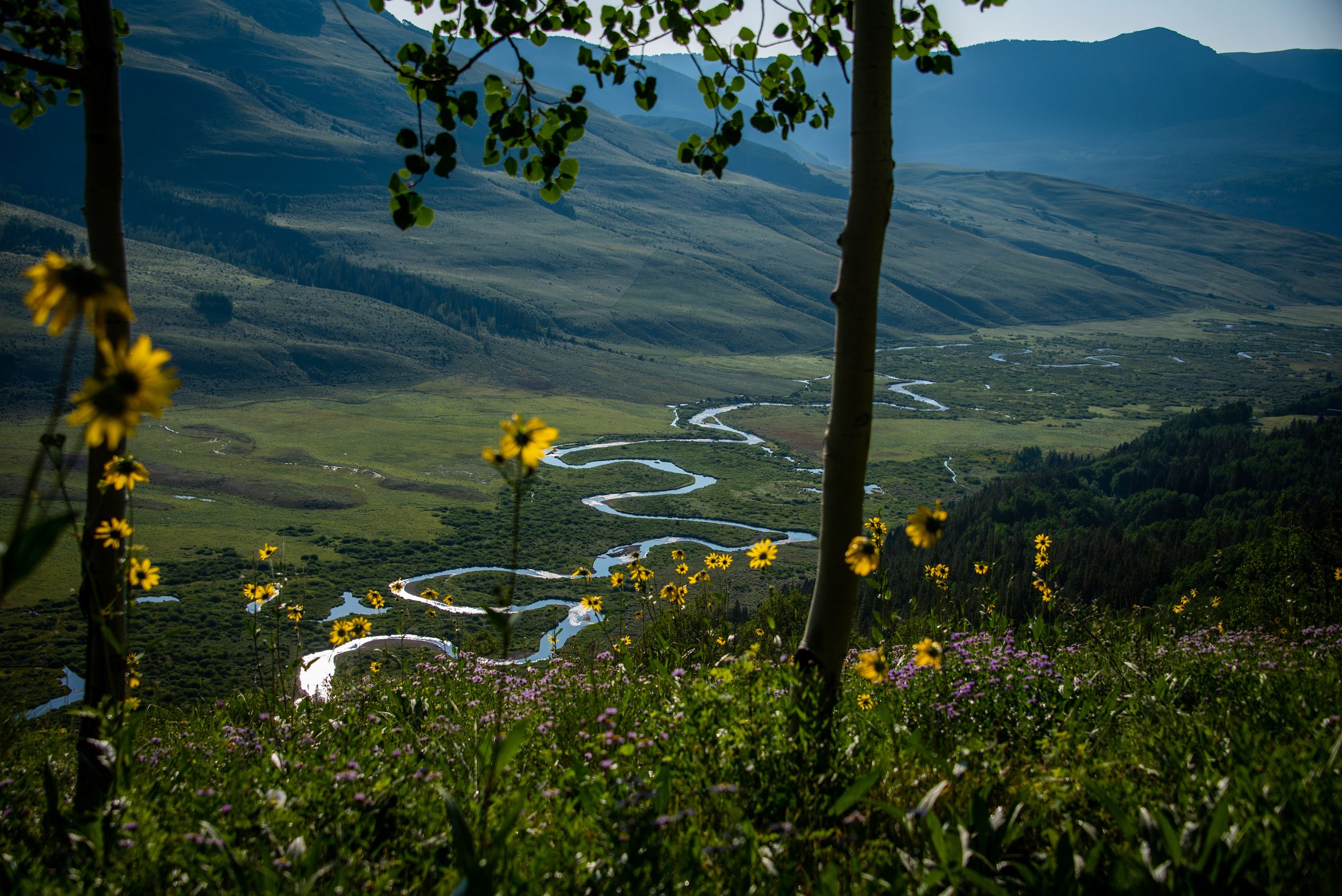 A river winds through a valley