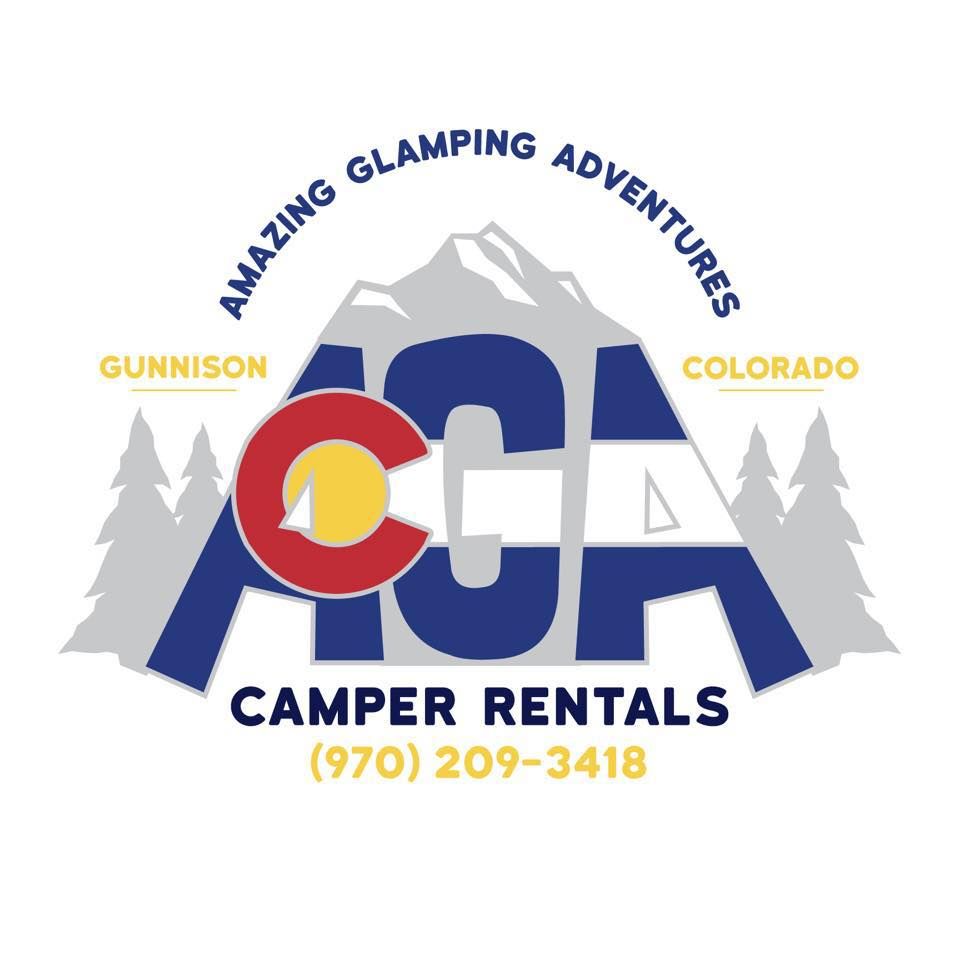 amazing glamping adventures camper. A camper sits on dirt road surrounded by pine trees