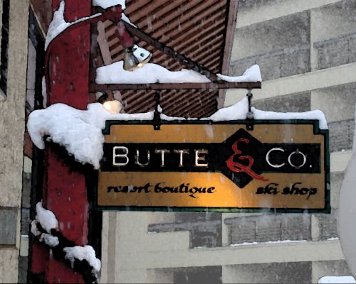 The sign for Butte and Co ski rentals. The sign reads "Butte & Co resort boutique ski shop."