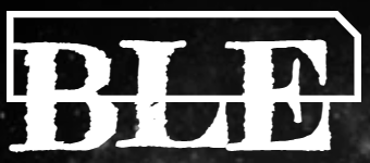 Blackline Entertainment setup. Audio equipment is set up in front of a stage.