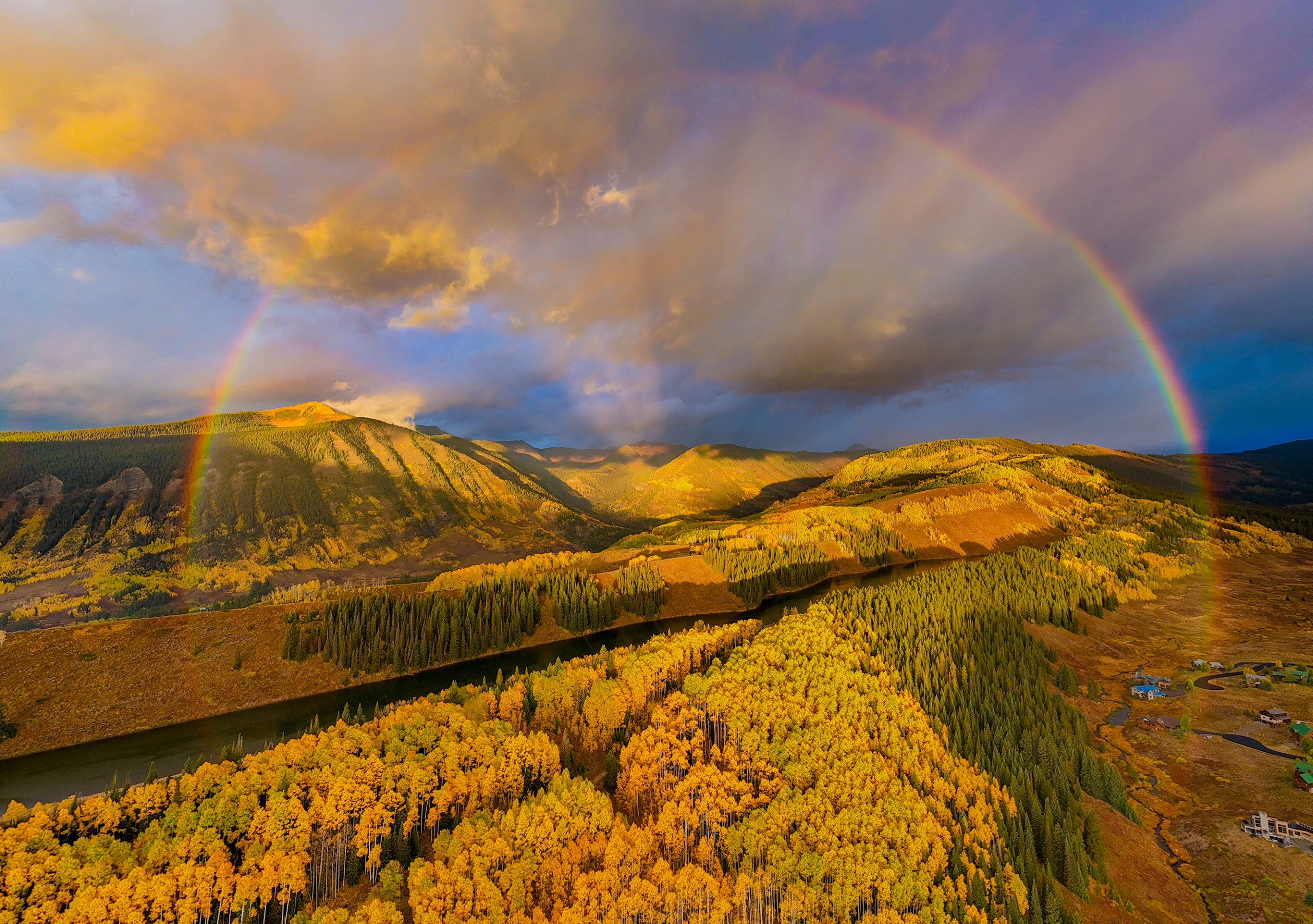 Art in Crested Butte and Gunnison - a rainbow over the mountains in summer