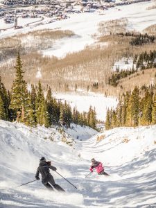 Two women ski Banana at Crested Butte.