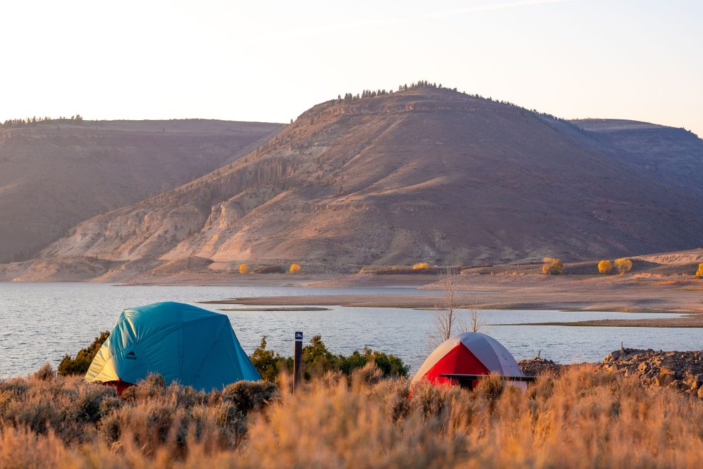 Tents pitched at Blue Mesa Reservoir in Gunnison, CO