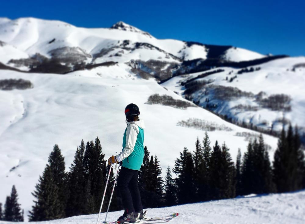 Spring skiing weather in Crested Butte on a bluebird day means lots of sun