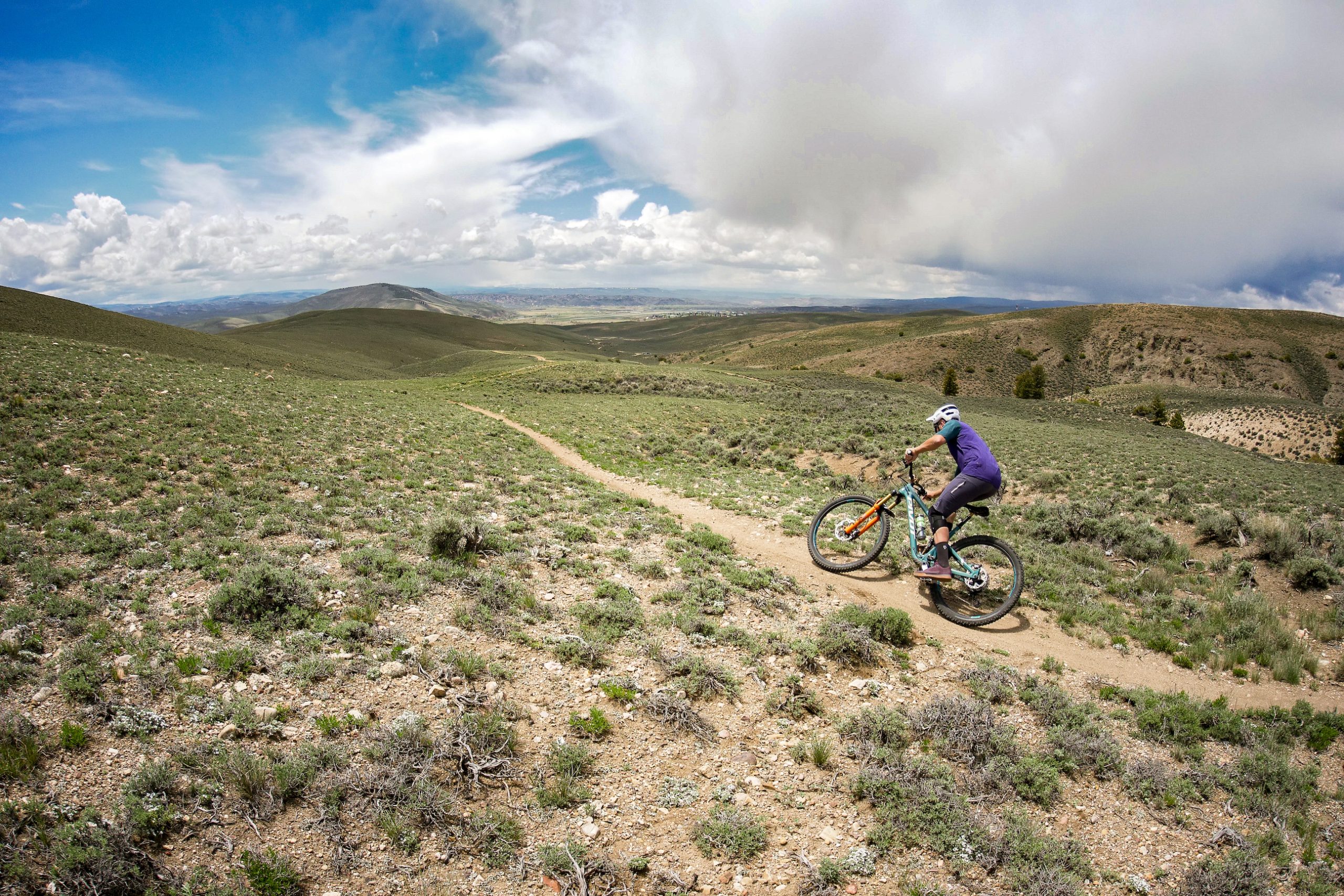 A person riding a bike during a colorado spring weekend getaway