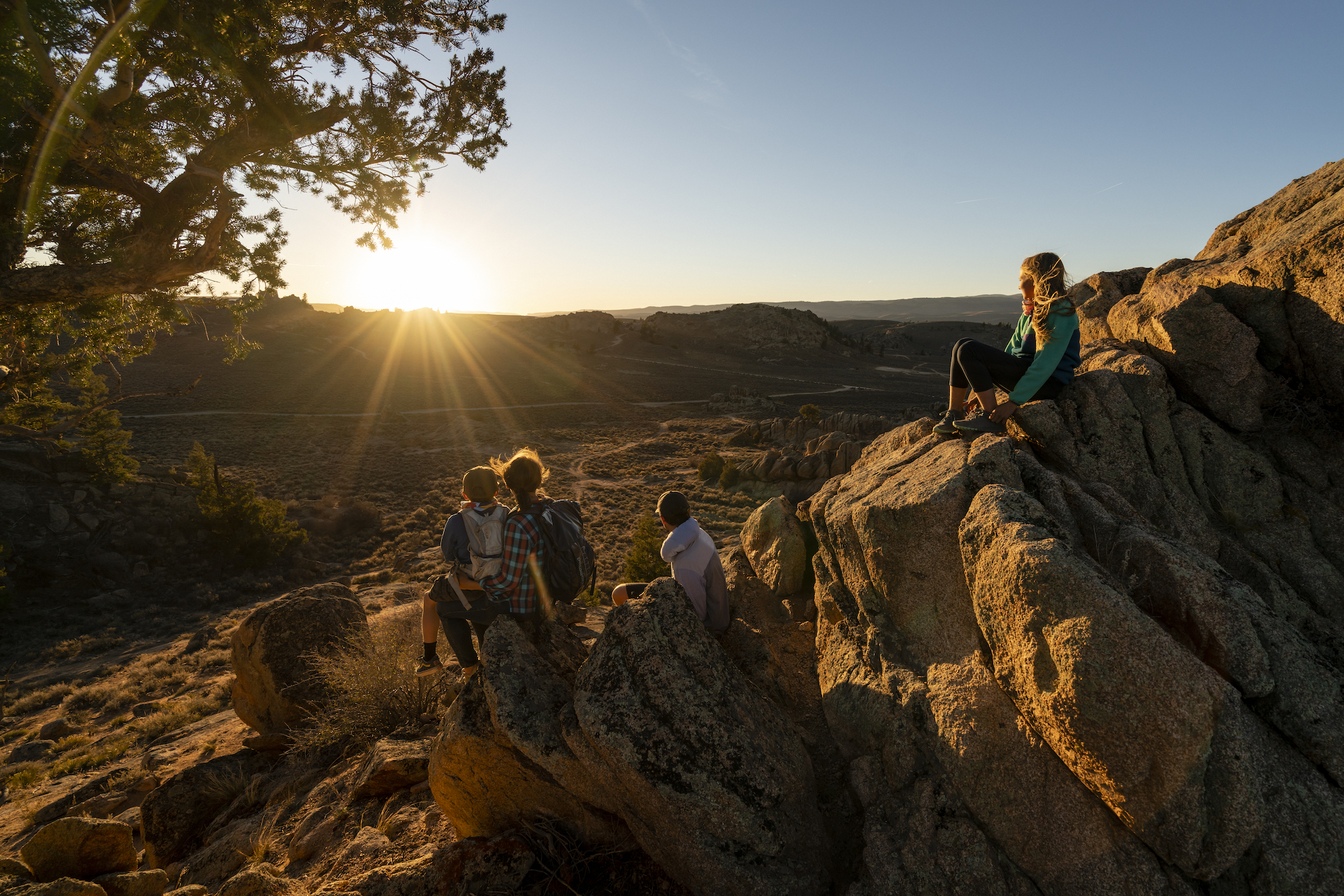 A group of people hiking hartman rocks 