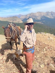 A Wildlife Area Manager with Colorado Parks and Wildlife rides a horse in Gunnison, Colorado.