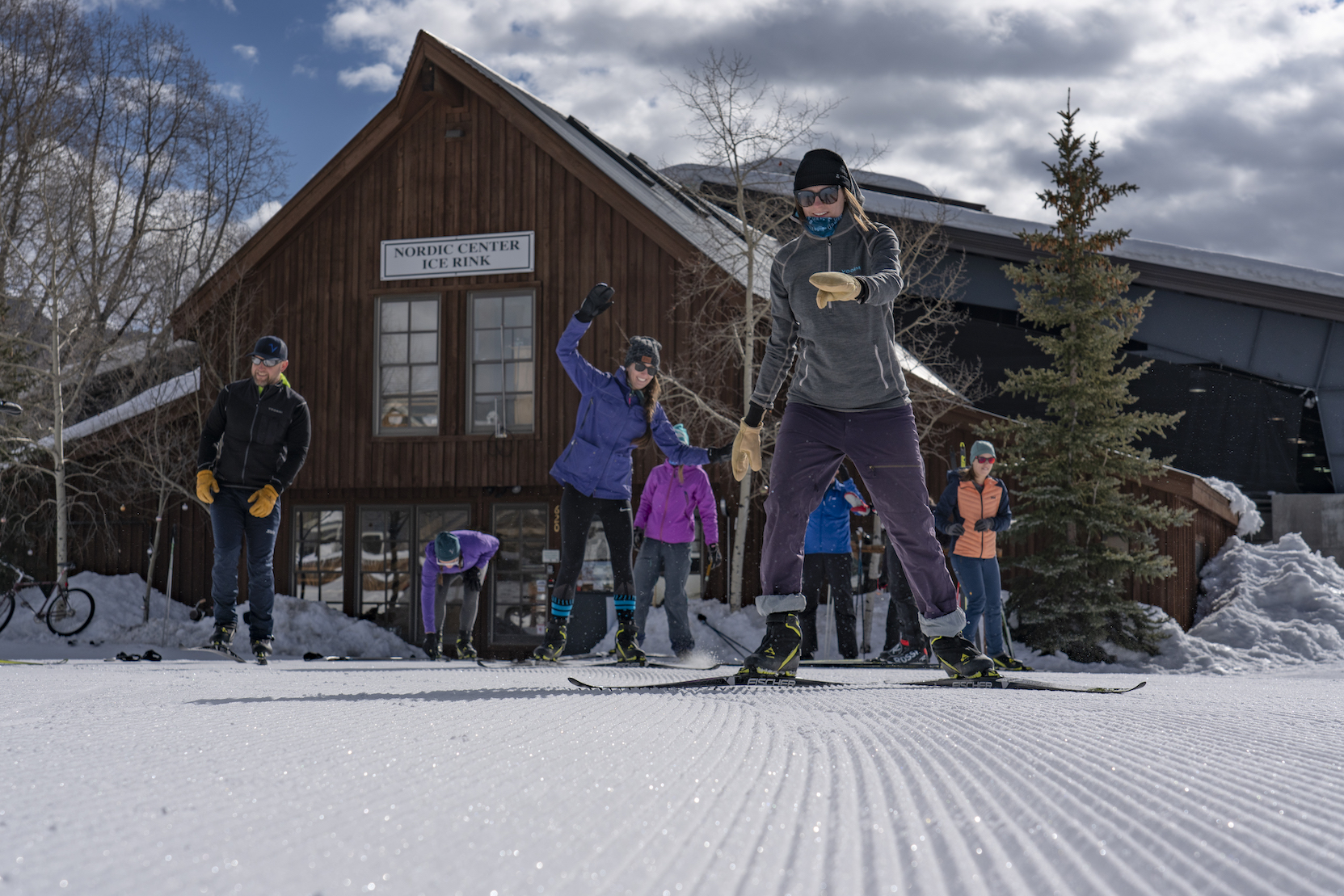 a group of people learning how to nordic ski. Take lessons at the nordic center in Crested Butte