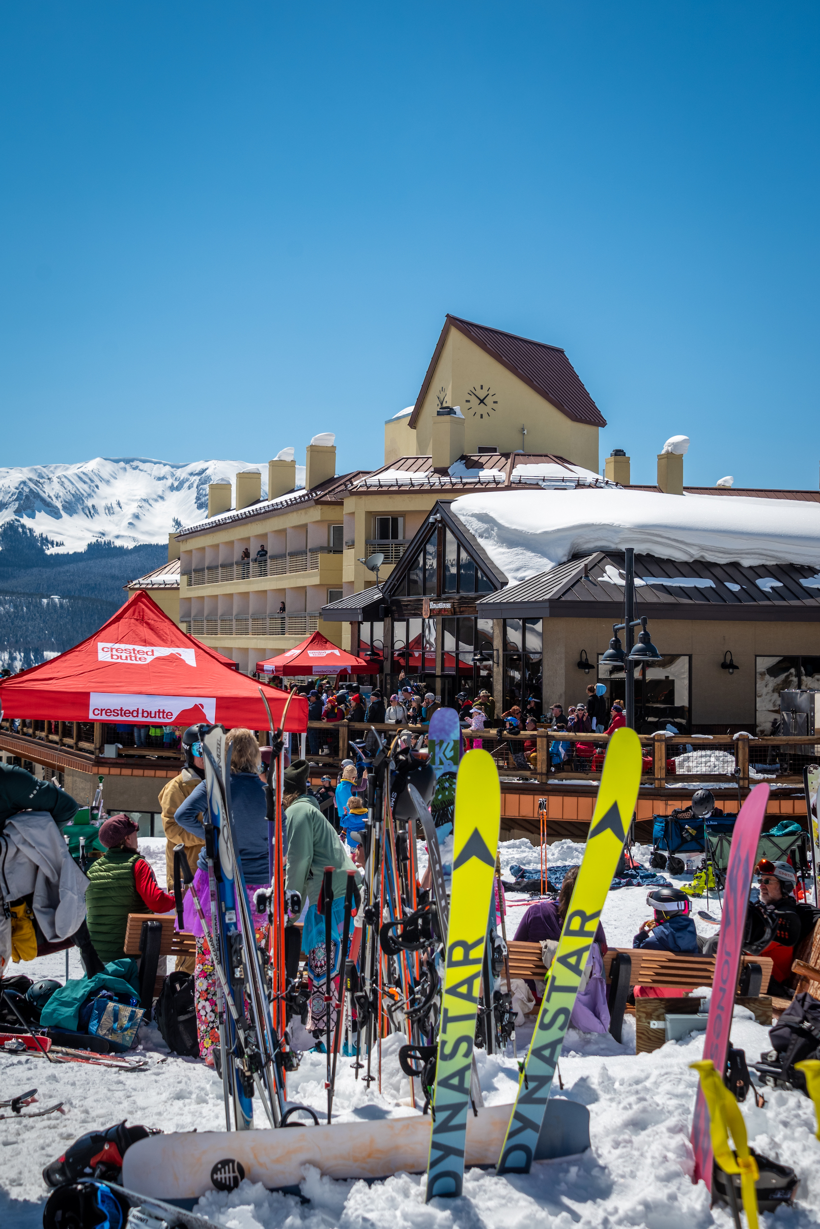 A large crowd of people gather on a deck