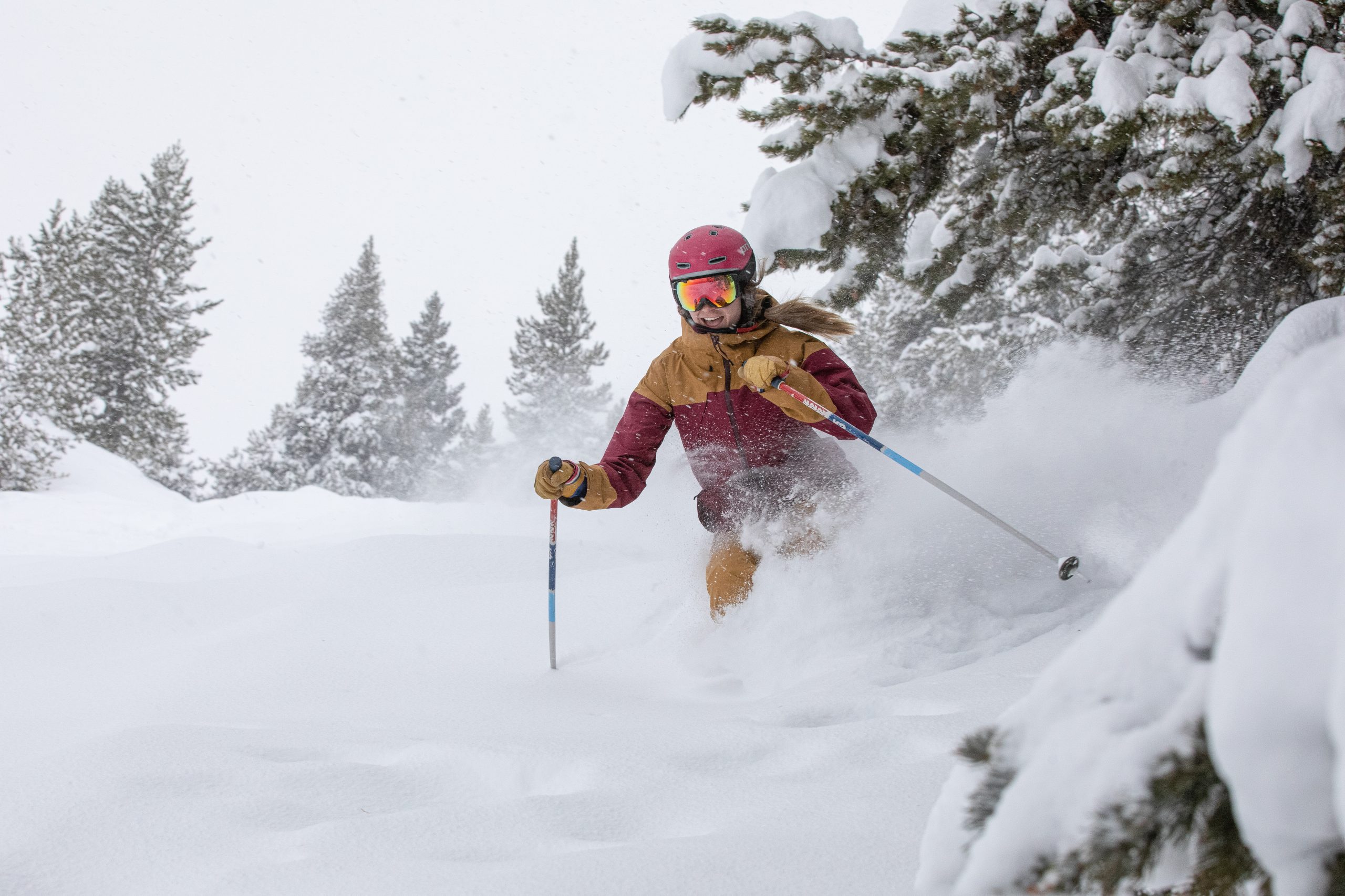 A woman skis through powder at Crested Butte.