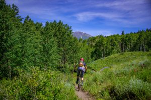 Mountain biking on Strand Hill in Crested Butte, Colorado.